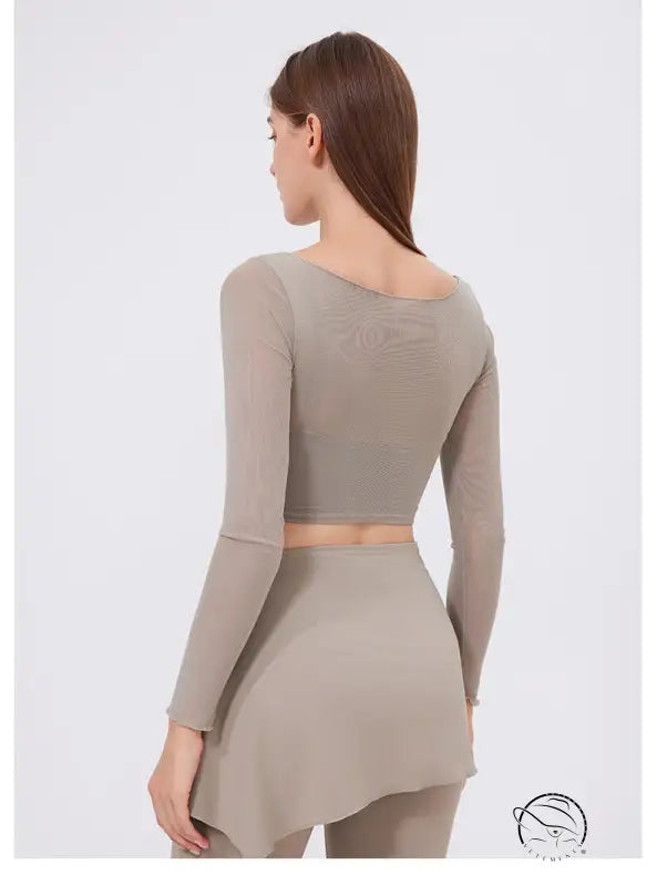 Taupe faux two piece mesh sports long sleeve cropped top with sheer back