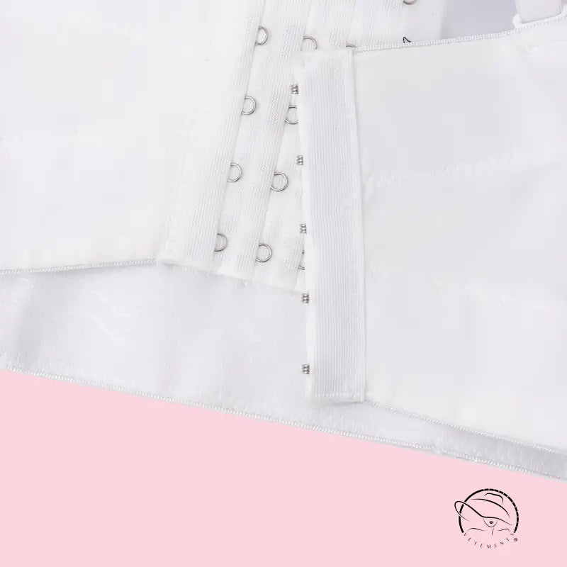 White lace-up langry corset top in bridal fashion with silver eyelets