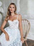 Elegant white fairy dress with rhinestone corset straps and large swing tulle