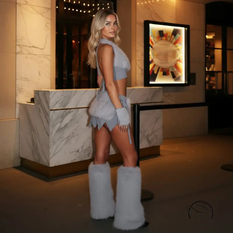Elegant halter camisole set with grey fringe boots and fluffy trim