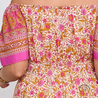 Elegant bohemian dress with floral off-shoulder top and smocked waist