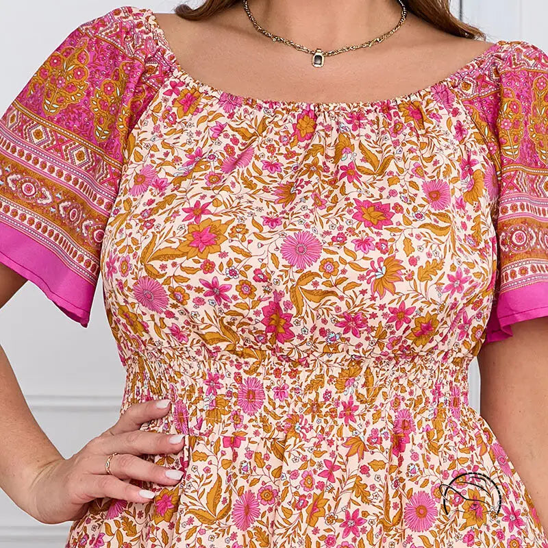 Elegant bohemian dress with floral off-shoulder top and smocked waist