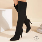 Black thigh-high stiletto boots in langry fashion for ملابس