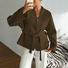Olive green belted blazer with wide sleeves and notched lapels in langry fashion