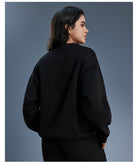 Black long sleeve fleece hoodie with ribbed cuffs and hem