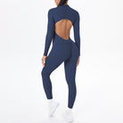 Navy blue long sleeve yoga one-piece with back cutout and ruched waistband