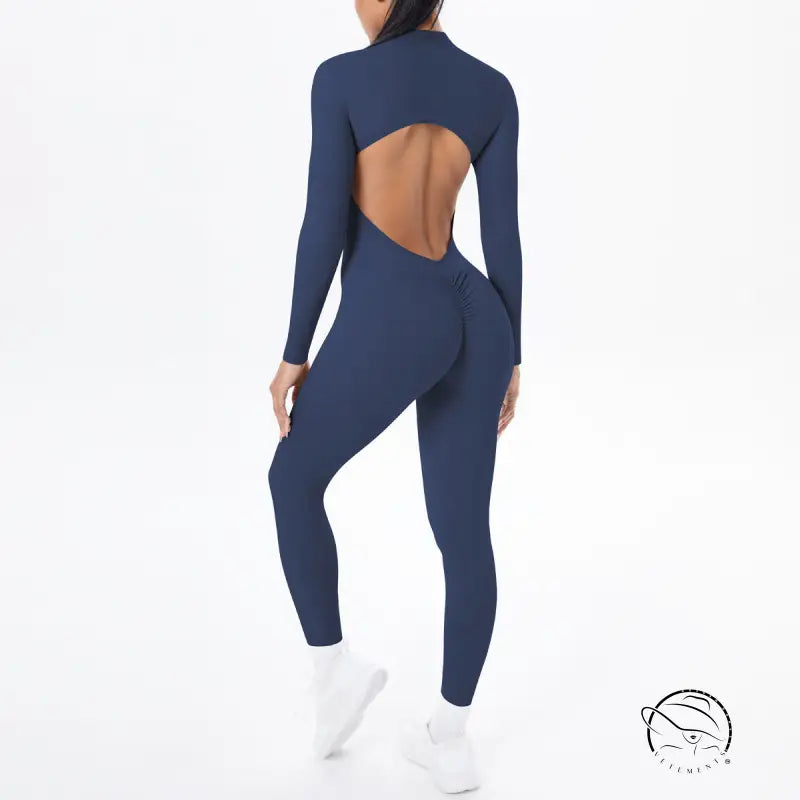 Navy blue long sleeve yoga one-piece with back cutout and ruched waistband