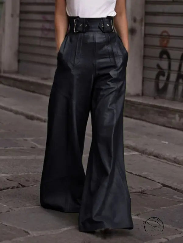Black faux leather bell bottom pants with high waist and buckle details