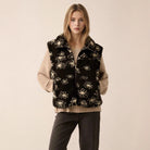 Black and white floral wool coat with polo collar and fur trim by Langry