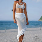 White beach three layer lotus beveled crochet two-piece outfit with asymmetrical ruffled skirt