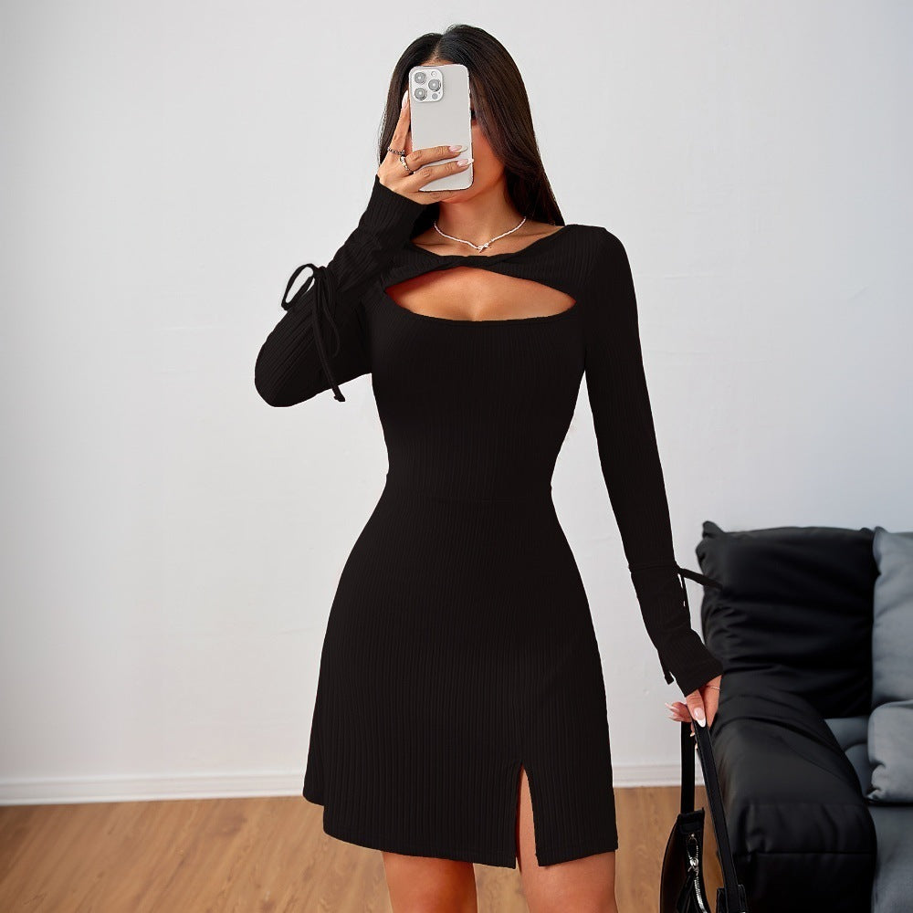 Black long-sleeve mini dress with chest cutout and front slit for trendy fashion ملابس