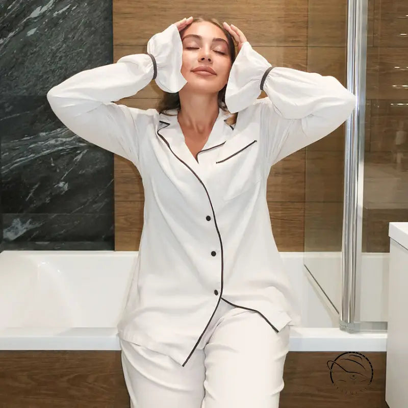 Langry fashion white silk pajama set with black piping and buttons