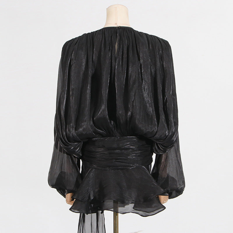 Black shimmering blouse with balloon sleeves for a fashionable look in ملابس