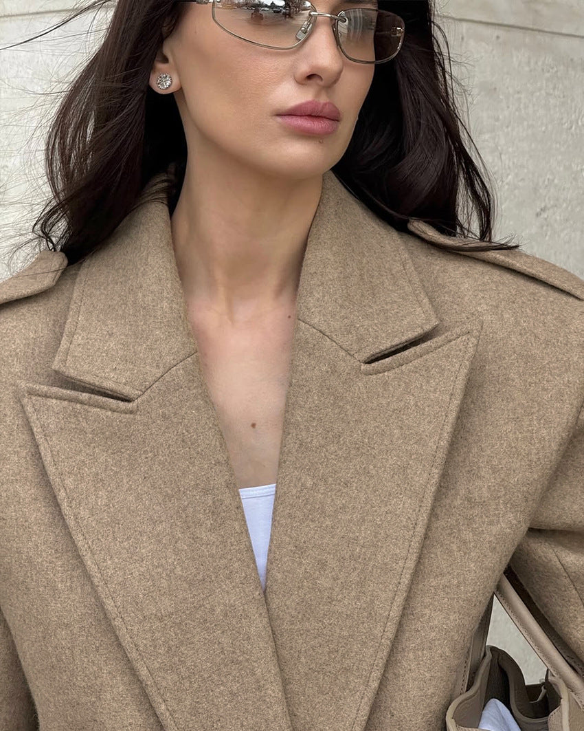 Elegant beige wool langry fashion coat with double-breasted notched lapels