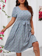 Plus-size floral summer dress with square neck, puff sleeves, tie waist