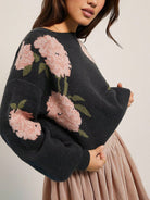 Langry fashion black floral round neck loose knitwear with pink flowers