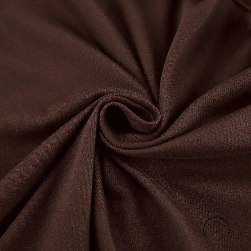 Close-up of rich brown comfortable knitted pajamas fabric