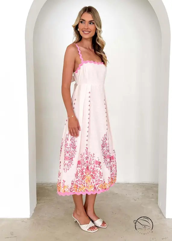 Attractive backless dress with white sundress pink floral hem and buttons