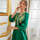 Emerald green satin langry fashion dress with gold floral embroidery and bell sleeves