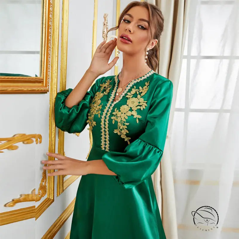 Emerald green satin langry fashion dress with gold floral embroidery and bell sleeves