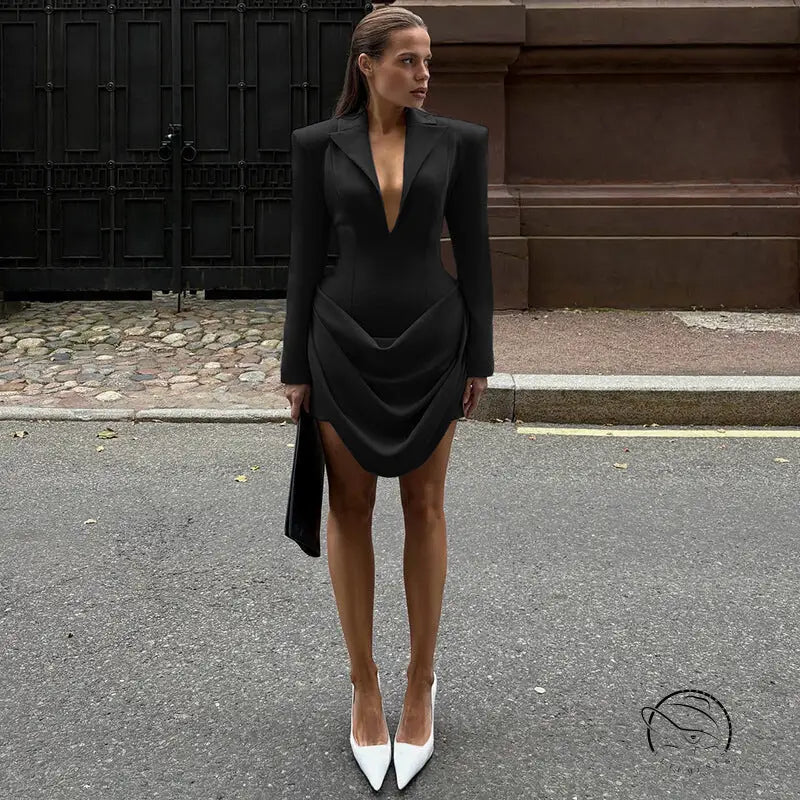 Slim deep v plunge neck black blazer dress with asymmetrical hem and white heels