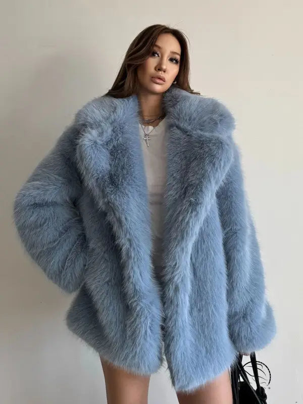 Light blue faux fur coat with fox collar and long sleeves