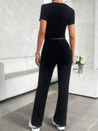 Black high-waisted wide-leg yoga pants in langry fashion ملابس set