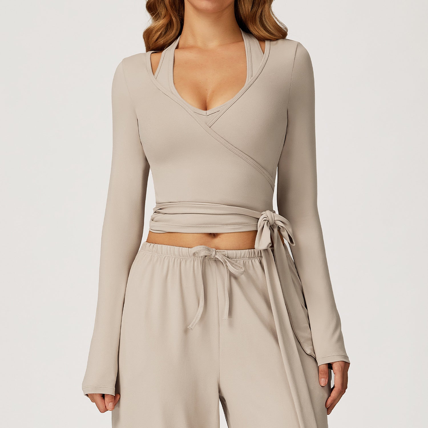 Beige langry fashion wrap crop top with long sleeves and tie waist for yoga