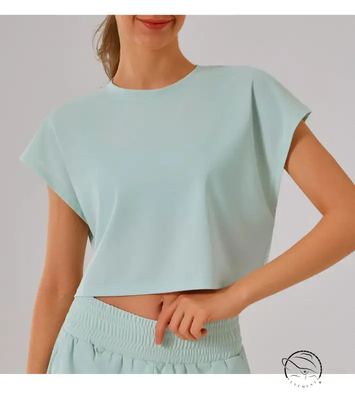 Mint green cropped t-shirt with cap sleeves in loose sports yoga fitness set