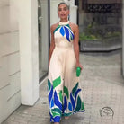 Summer printed cream maxi dress with leaf patterns and halter neck