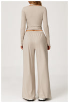 Langry beige wide-leg yoga jumpsuit with belt detail, fashion ملابس