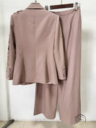 Elegant floral jacket in dusty rose with embellished sleeves