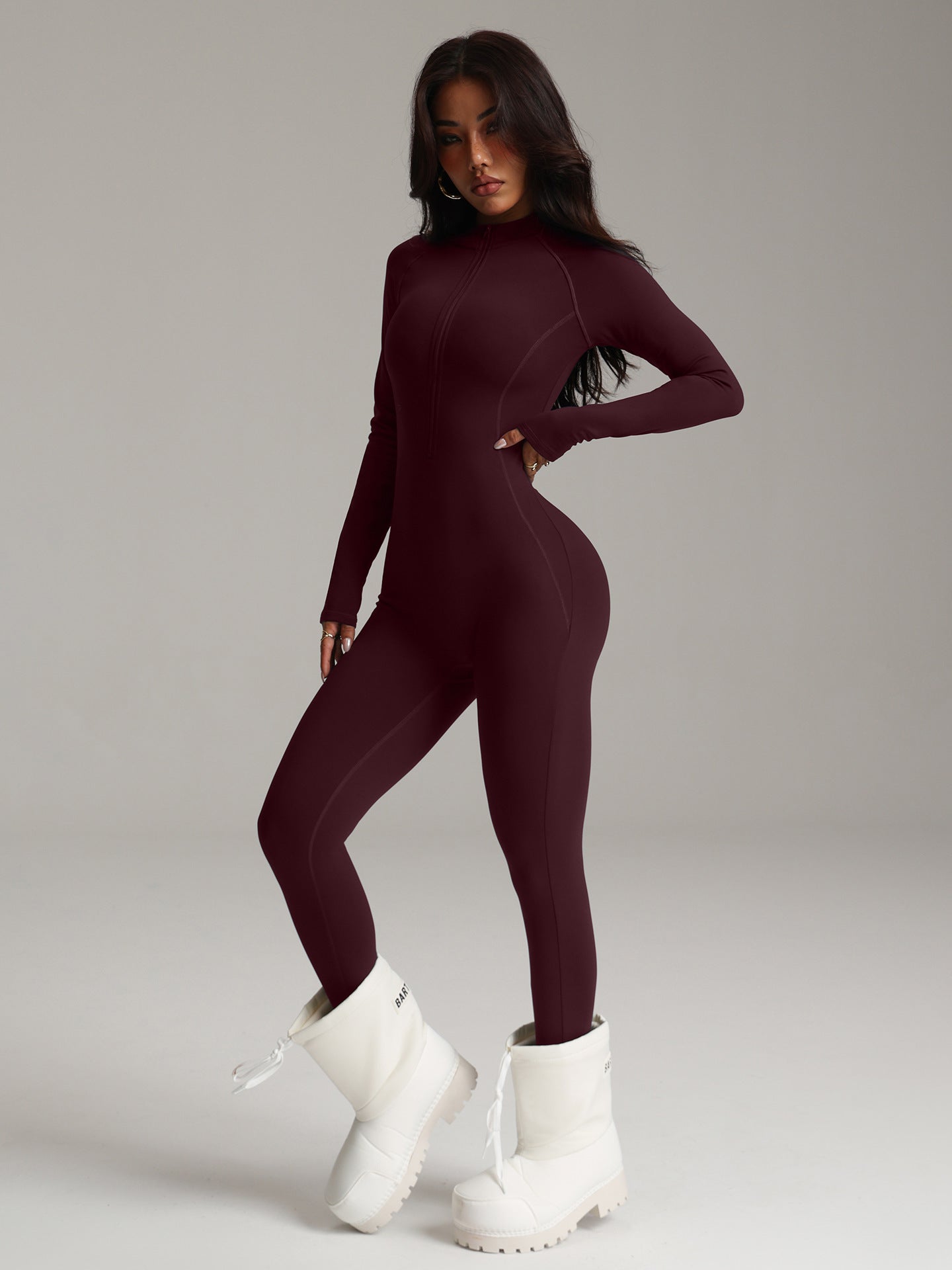 Burgundy stretchy langry fashion bodysuit with white chunky platform boots