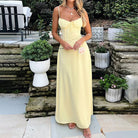 Elegant Lace Up A Line Dress in vibrant yellow, perfect for modern fashion enthusiasts