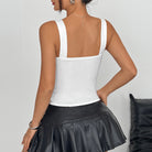 Langry fashion white strappy backless top with pleated skirt and gold necklace