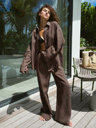 Woman in brown linen suit showcasing fashionable Cotton Shirt Trousers Casual Sets