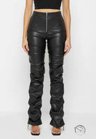 Tight faux leather ruched pants in Four Seasons style