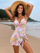 Floral print swim dress with straw hat, perfect for fashionable summer outings in ملابس