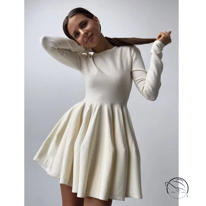 Beautiful woolen knitted cream-colored fit-and-flare dress