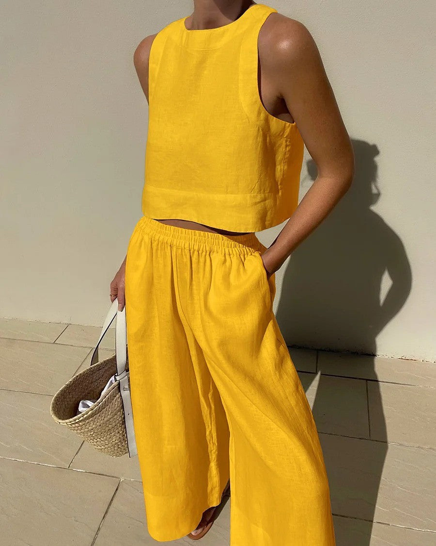 Yellow linen two-piece outfit featuring a casual loose sleeveless shirt for stylish ملابس