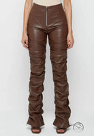 Tight faux leather ruched pants in Four Seasons style