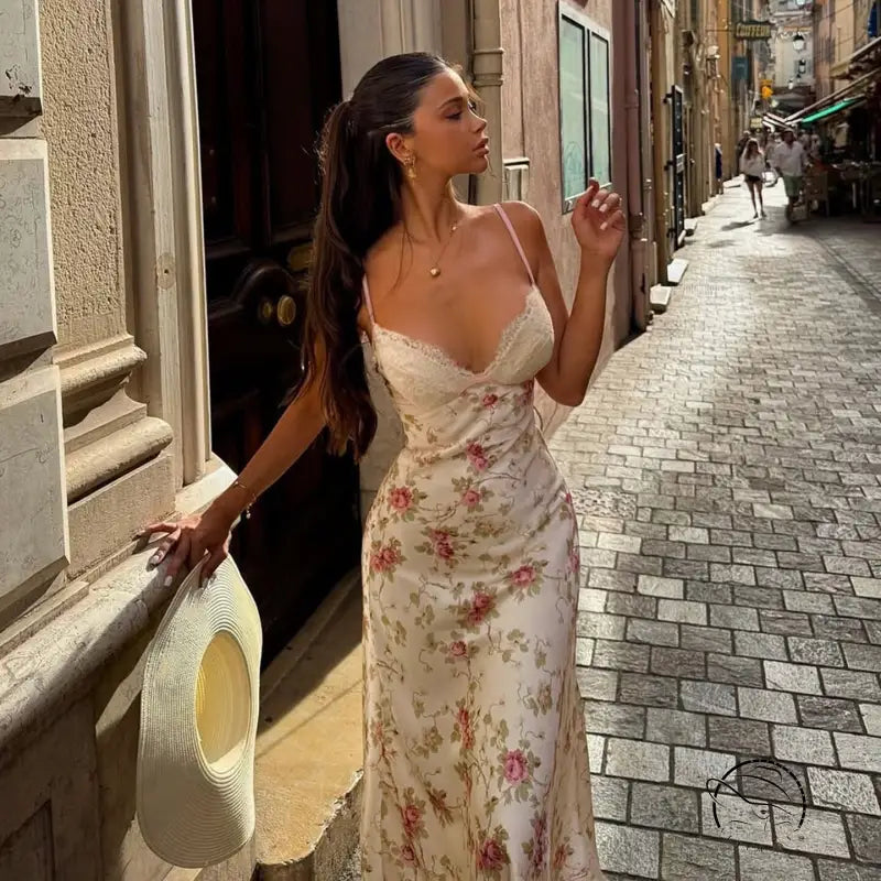 Elegant floral A-line maxi dress in off-white satin with pink and green embroidery