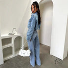 Vintage pocket washed jeans with cropped denim jacket and white handbag
