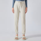 Cream-colored cotton jogger sweatpants for women, ideal for fashion and outdoor fitness