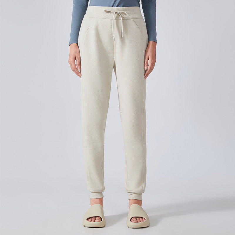 Cream-colored cotton jogger sweatpants for women, ideal for fashion and outdoor fitness