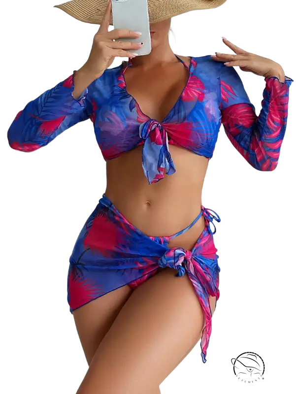 Four piece lace up swimsuit in vibrant blue and pink tropical leaves