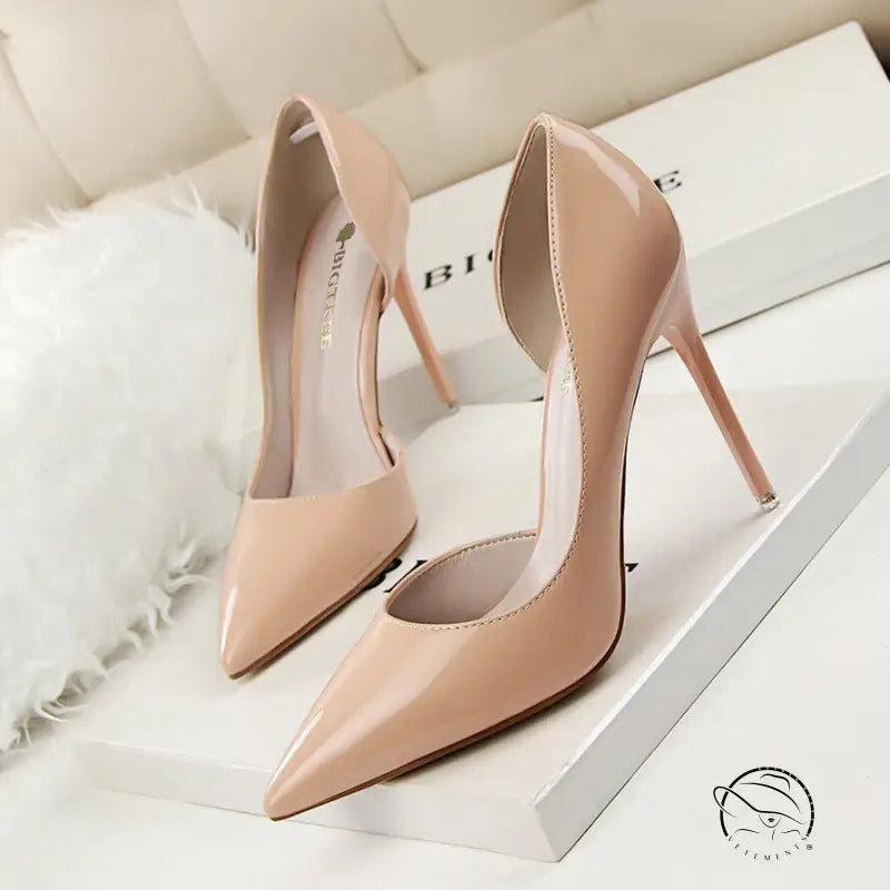 Nude patent leather low cut high heels with pointed stiletto toes