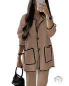 Beige blazer in camel suit with black scalloped trim and three-quarter sleeves