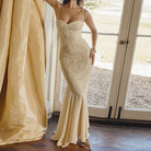 Lace-covered cream cami dress displayed elegantly for fashion-forward women