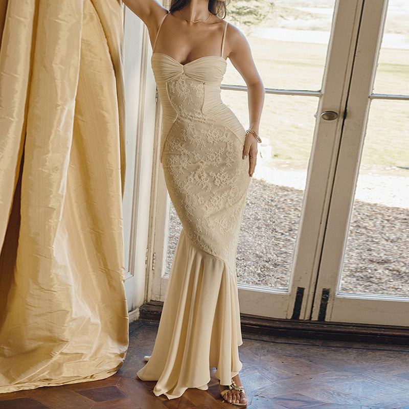 Lace-covered cream cami dress displayed elegantly for fashion-forward women